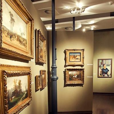 The interior of old carriage house which is a home of the Old Masters Gallery